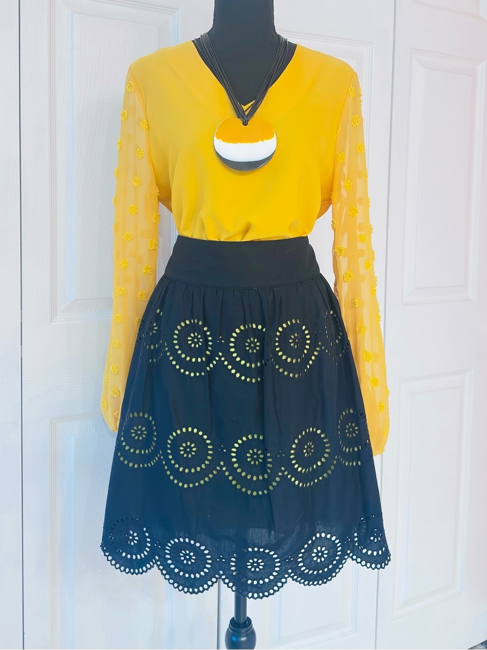 OLIVIA MARK ~ Women’s yellow top w/sheer sleeves and circle accents size M